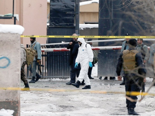 afghan policemen keep watch at the site of a bomb blast in kabul photo reuters afghan policemen keep watch at the site of a bomb blast in kabul photo reuters