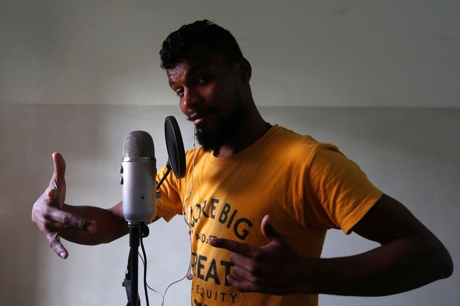 lyari underground l u g rapper slipknot denna poses for a camera during an interview with reuters in karachi photo reuters