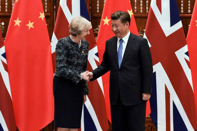 chinese president xi jinping r shakes hand with british prime minister theresa may before their meeting at the west lake state house on the sidelines of the g20 summit in hangzhou zhejiang province china september 5 2016 photo reuters file