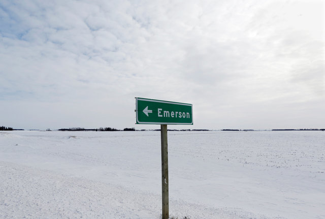 a sign post for the small border town of emerson near the canada us border crossing where refugees make their way often on foot into the province is seen in emerson manitoba canada february 1 2017 photo reuters