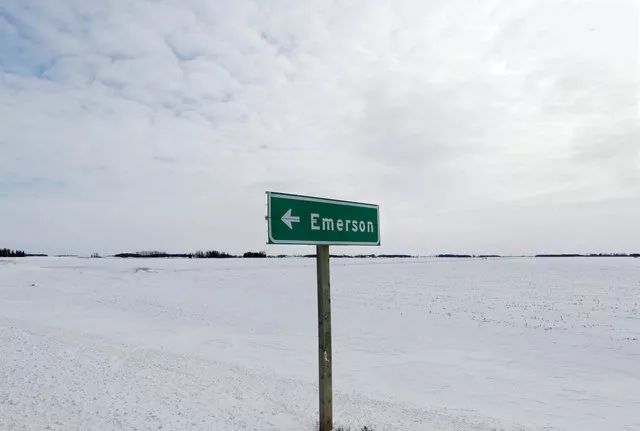 a sign post for the small border town of emerson near the canada us border crossing where refugees make their way often on foot into the province is seen in emerson manitoba canada february 1 2017 photo reuters a sign post for the small border town of emerson near the canada us border crossing where refugees make their way often on foot into the province is seen in emerson manitoba canada february 1 2017 photo reuters