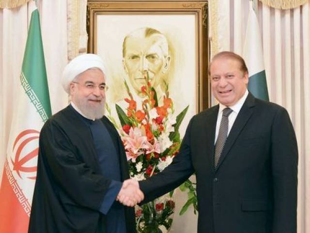 prime minister nawaz sharif shakes hands with iranian president hasan rowhani photo afp