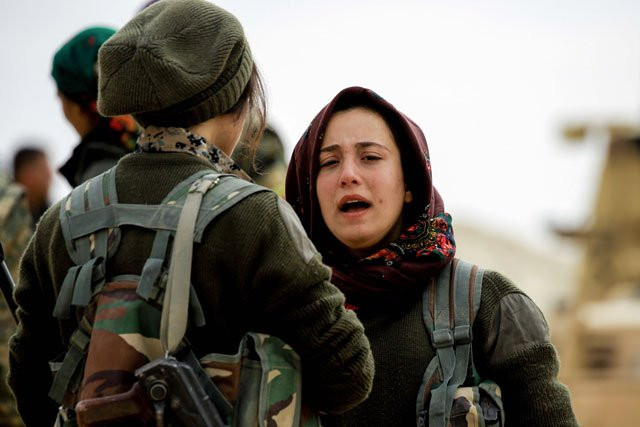 batul a 21 year old female arab fighter among the syrian democratic forces made up of us backed kurdish and arab fighters talks with another fighter near the village of al torshan 20 km on the outskirts of raqa on february 6 2017 photo afp batul a 21 year old female arab fighter among the syrian democratic forces made up of us backed kurdish and arab fighters talks with another fighter near the village of al torshan 20 km on the outskirts of raqa on february 6 2017 photo afp