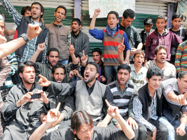 kashmiri muslim youth shout pro freedom and anti election slogans during a protest outside a polling station at kangan in srinagar photo afp kashmiri muslim youth shout pro freedom and anti election slogans during a protest outside a polling station at kangan in srinagar photo afp