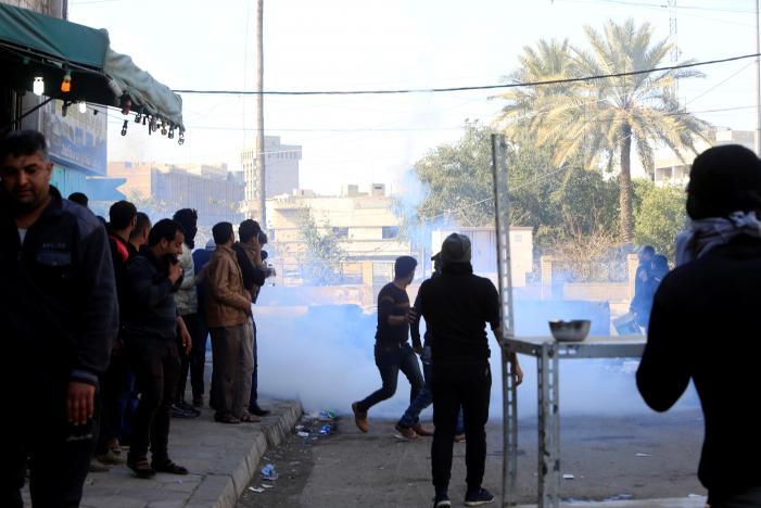 iraqi security forces fire tear gas after supporters of iraqi shi 039 ite cleric moqtada al sadr tried to approach the heavily fortified green zone during a protest at tahrir square in baghdad iraq february 11 2017 photo reuters