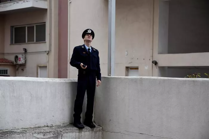 a police officer checks the nearby apartment buildings for residents who have not evacuated before an operation to defuse a 250 kg world war two bomb found during excavation works at a gas station on the northern city of thessaloniki greece february 12 2017 photo reuters a police officer checks the nearby apartment buildings for residents who have not evacuated before an operation to defuse a 250 kg world war two bomb found during excavation works at a gas station on the northern city of thessaloniki greece february 12 2017 photo reuters