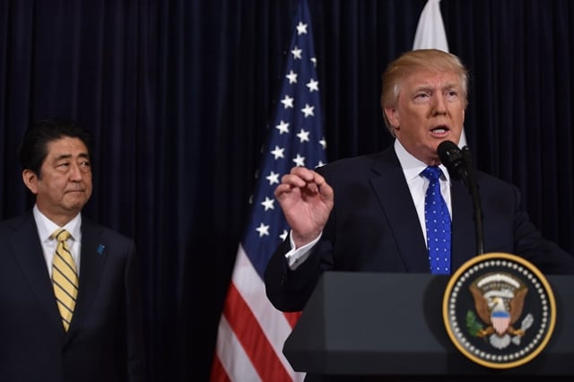 japanese prime minister shinzo abe l and us president donald trump speak at trump 039 s mar a lago resort in palm beach florida on february 11 2017 after north korea reportedly fired a ballistic missile the first since donald trump became us president photo afp japanese prime minister shinzo abe l and us president donald trump speak at trump 039 s mar a lago resort in palm beach florida on february 11 2017 after north korea reportedly fired a ballistic missile the first since donald trump became us president photo afp