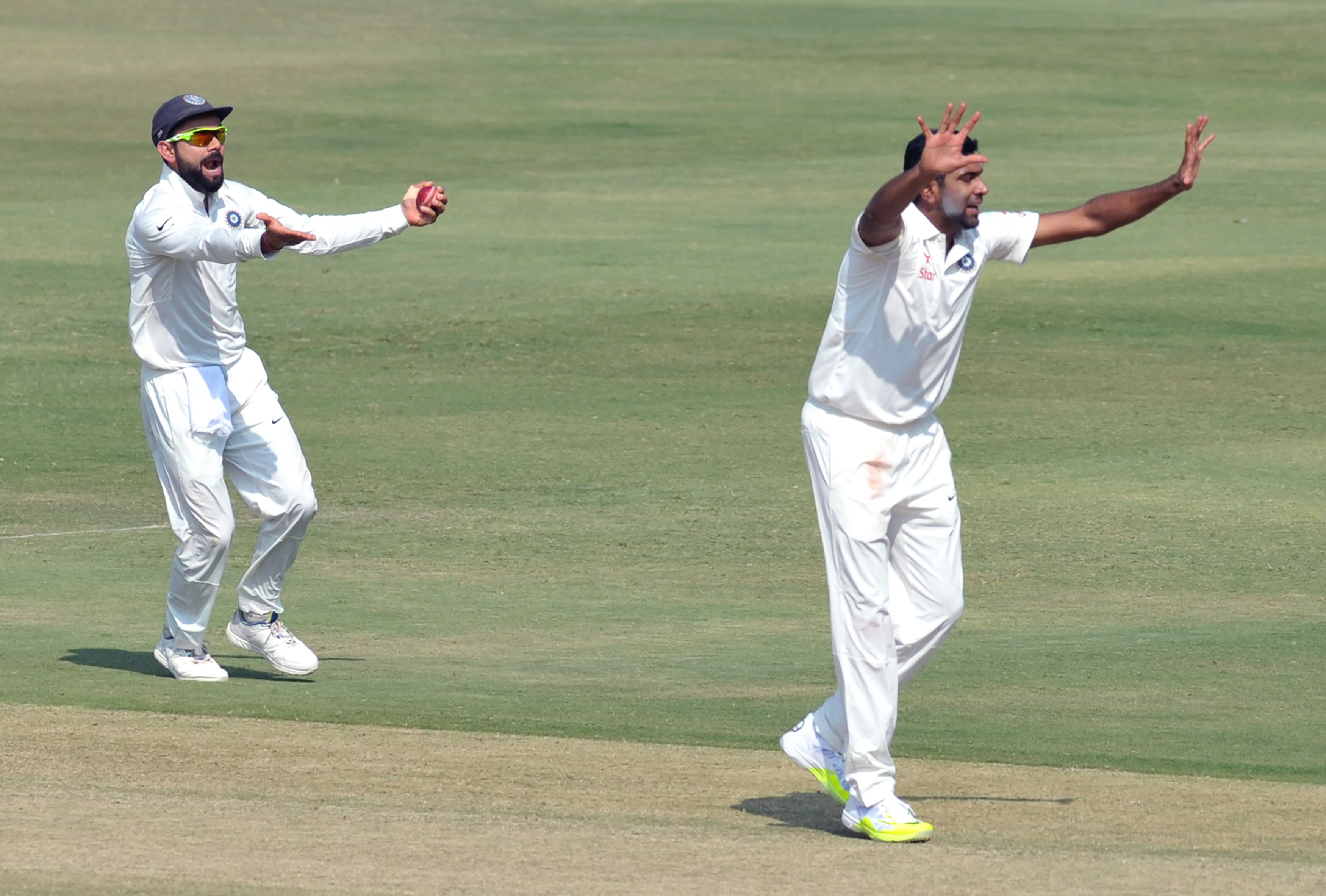 kohli l and ashwin successfully appeal for the wicket of bangladesh 039 s tamim iqbal on the fourth day ashwin earlier became the fastest ever bowler to 250 wickets photo afp