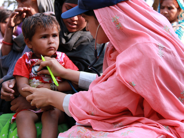 a file photo of a health worker helping a child photo file