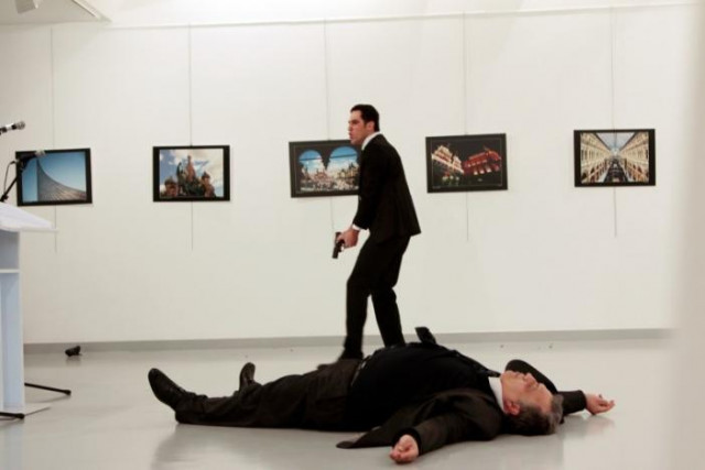 russian ambassador to turkey andrei karlov lies on the ground after he was shot by mevlut mert altintas at an art gallery in ankara turkey photo reuters russian ambassador to turkey andrei karlov lies on the ground after he was shot by mevlut mert altintas at an art gallery in ankara turkey photo reuters