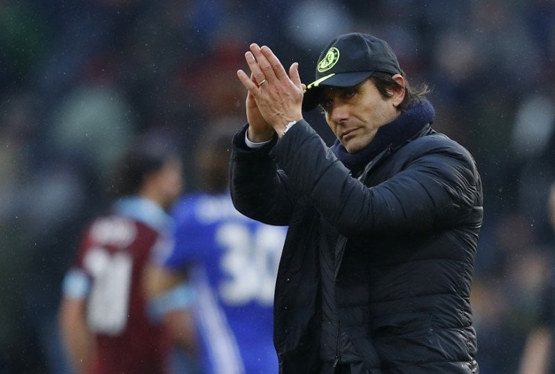 chelsea manager antonio conte applauds fans after the game against burnley on sunday photo reuters