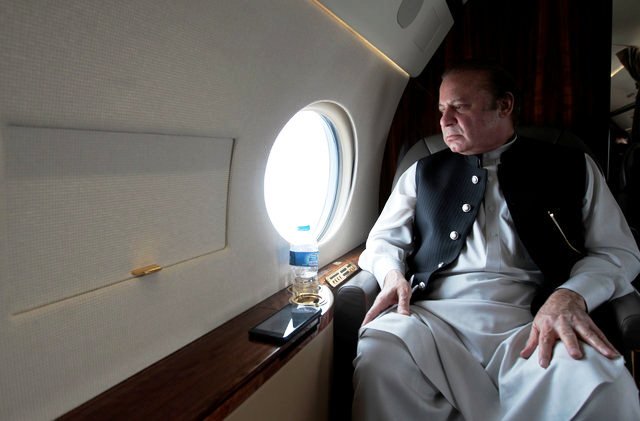 pakistani prime minister nawaz sharif looks out the window of his plane after attending a ceremony to inaugurate the m9 motorway between karachi and hyderabad pakistan february 3 2017 reuters caren firouz