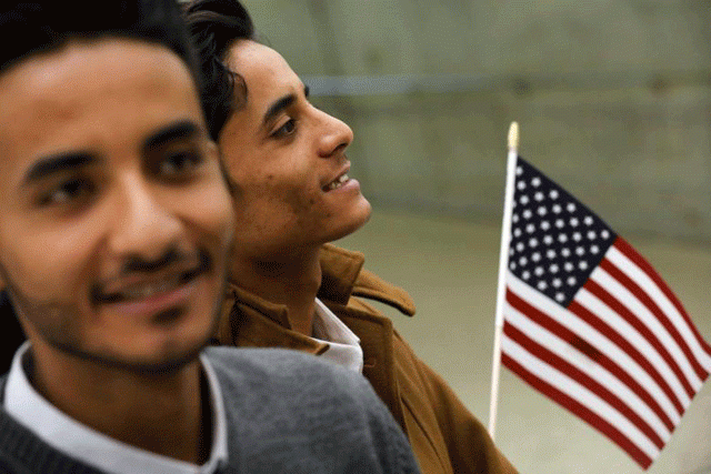 tareq aziz left and his brother ammar aziz yemeni nationals who were delayed entry into the us because of the recent travel ban smile as they are reunited with their family at washington dulles international airport photo reuters