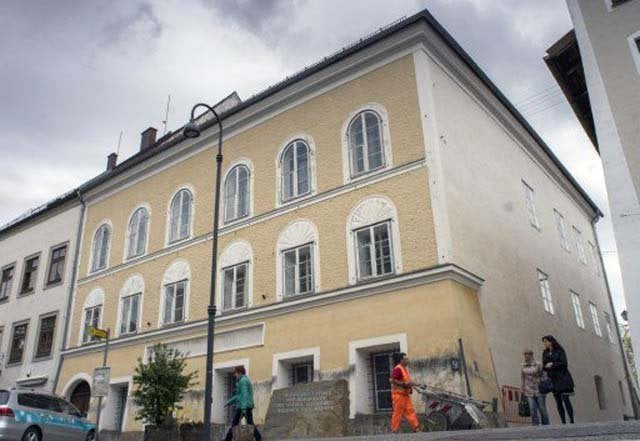 this photo shows a memorial stone outside the house where adolf hitler was born in braunau am inn austria photo afp this photo shows a memorial stone outside the house where adolf hitler was born in braunau am inn austria photo afp