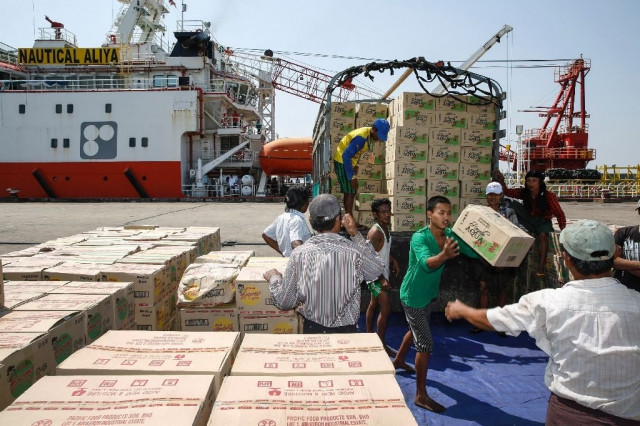 myanmar workers load boxes of relief aid for rohingya muslims delivered by the humanitarian aid malaysian ship nautical aliya in yangon 039 s thilawa port on february 10 2017 photo afp myanmar workers load boxes of relief aid for rohingya muslims delivered by the humanitarian aid malaysian ship nautical aliya in yangon 039 s thilawa port on february 10 2017 photo afp