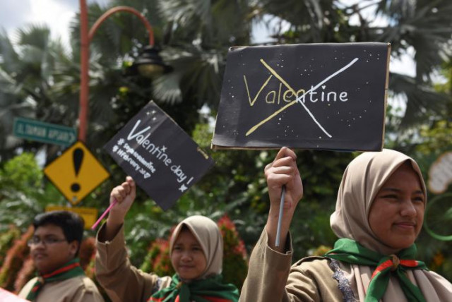 muslim students hold posters during a protest against valentine 039 s day celebrations in surabaya indonesia february 13 2017 photo reuters muslim students hold posters during a protest against valentine 039 s day celebrations in surabaya indonesia february 13 2017 photo reuters