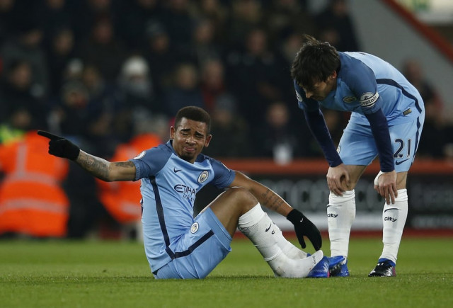 manchester city 039 s gabriel jesus l sits after sustaining an injury as david silva looks on in the match against bournemouth on february 14 2017 photo reuters manchester city 039 s gabriel jesus l sits after sustaining an injury as david silva looks on in the match against bournemouth on february 14 2017 photo reuters
