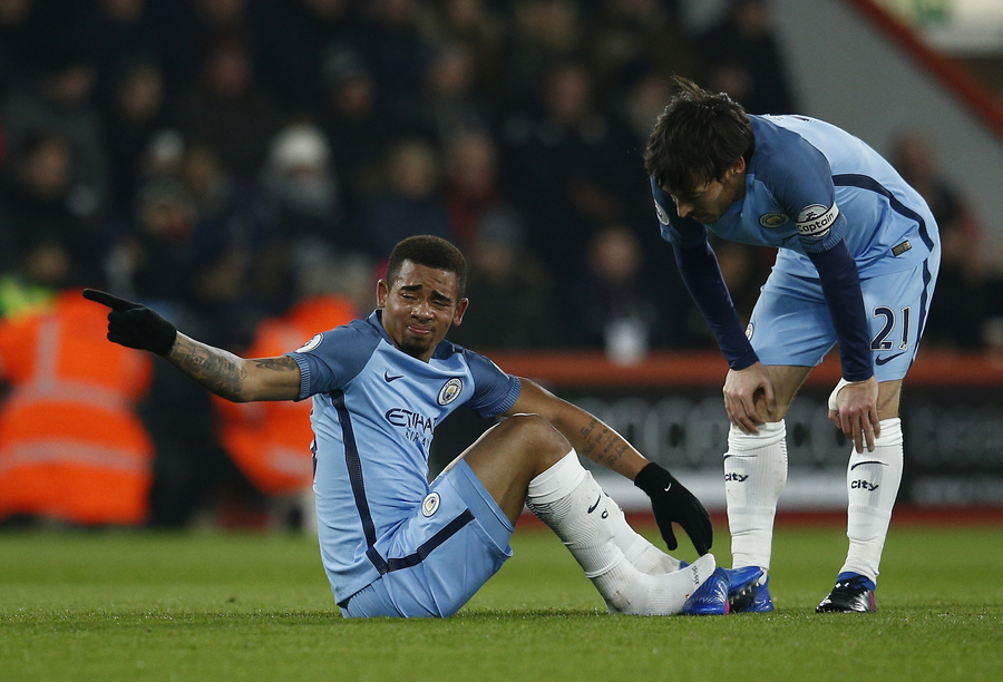 manchester city 039 s gabriel jesus l sits after sustaining an injury as david silva looks on in the match against bournemouth on february 14 2017 photo reuters