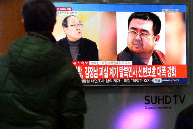 people watch a tv screen broadcasting a news report on the assassination of kim jong nam the older half brother of the north korean leader kim jong un at a railway station in seoul south korea february 14 2017 photo reuters
