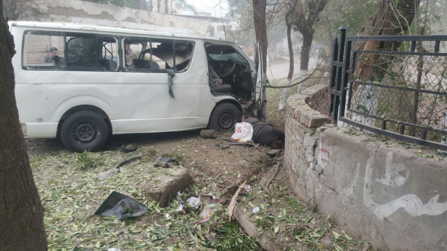 the blast targeted a government van a 5597 while it was on its way to judges colony in the hayatabad peshawar photo iftikhar firdous the blast targeted a government van a 5597 while it was on its way to judges colony in the hayatabad peshawar photo iftikhar firdous