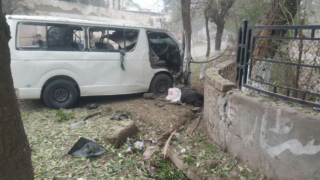 the blast targeted a government van a 5597 while it was on its way to judges colony in the hayatabad peshawar photo iftikhar firdous