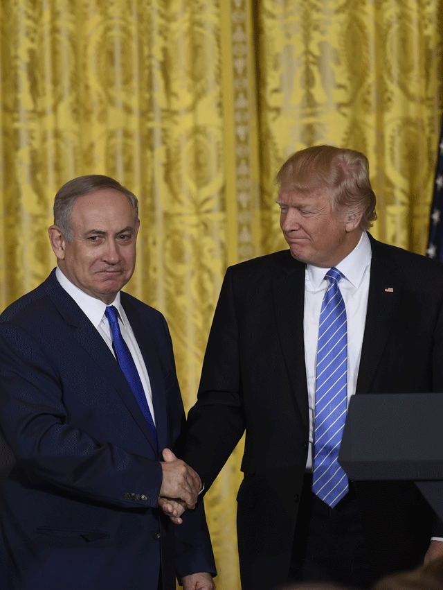 us president donald trump r and israeli prime minister benjamin netanyahu shake hands during a joint press conference in the east room of the white house in washington dc february 15 2017 photo afp