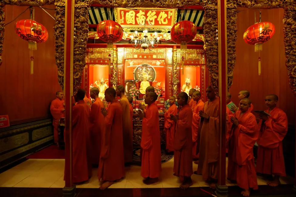 buddhist monks pray inside a temple during the lunar new year 039 s eve celebrations in chinatown in bangkok thailand reuters jorge silva buddhist monks pray inside a temple during the lunar new year 039 s eve celebrations in chinatown in bangkok thailand reuters jorge silva