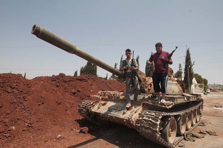 rebel fighters can be seen in syria who are trying to oust the president bashar al assad photo afp