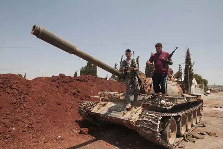 rebel fighters can be seen in syria who are trying to oust the president bashar al assad photo afp rebel fighters can be seen in syria who are trying to oust the president bashar al assad photo afp