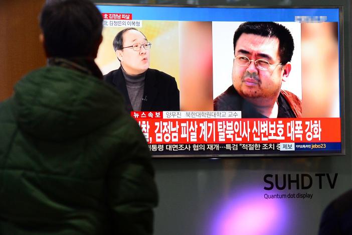 people watch a tv screen broadcasting a news report on the assassination of kim jong nam the older half brother of the north korean leader kim jong un at a railway station in seoul south korea february 14 2017 photo reuters