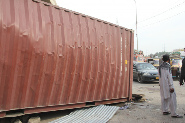 this container was on the truck that overturned near qayyumabad roundabout and killed three people on thursday afternoon photo ayesha mir express this container was on the truck that overturned near qayyumabad roundabout and killed three people on thursday afternoon photo ayesha mir express