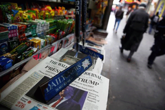 the cover of the wall street journal newspaper is seen with other papers at a news stand in new york us november 9 2016 photo reuters the cover of the wall street journal newspaper is seen with other papers at a news stand in new york us november 9 2016 photo reuters