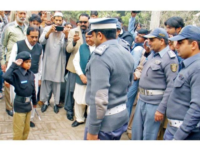 abdullah noor being received by traffic police officials at cto office photo express abdullah noor being received by traffic police officials at cto office photo express