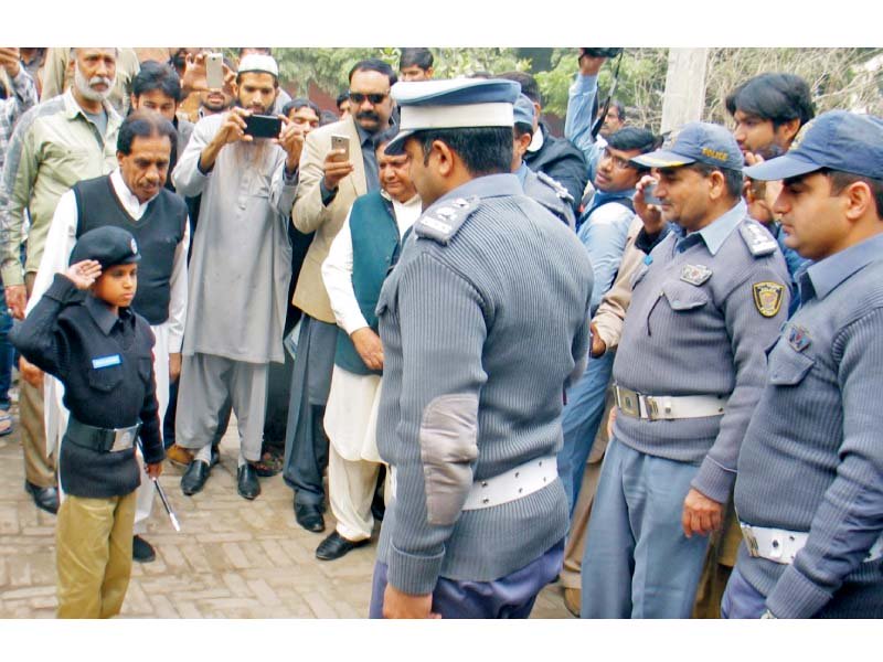 abdullah noor being received by traffic police officials at cto office photo express