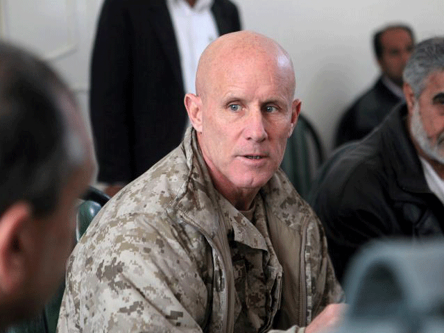 vice adm robert s harward commanding officer of combined joint interagency task force 435 speaks to an afghan official during his visit to zaranj afghanistan in this january 6 2011 photo reuters