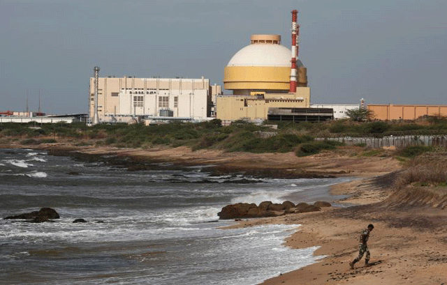 a policeman walks on a beach near kudankulam nuclear power project in the southern indian state of tamil nadu september 13 2012 photo reuters file