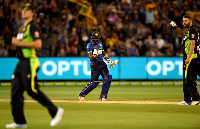sri lanka s kapugedera celebrates scoring the winning run during the first t20i match between australia and sri lanka at the mcg photo afp sri lanka s kapugedera celebrates scoring the winning run during the first t20i match between australia and sri lanka at the mcg photo afp