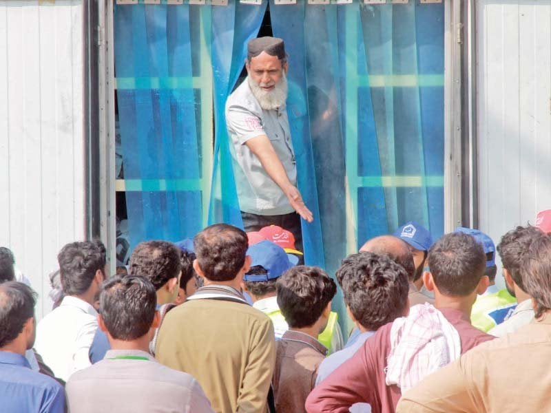 a mobile mortuary of edhi collects bodies a day after the deadly bombing at lal shahbaz qalandar s shrine in sehwan on friday health department officials confirmed that the death toll was 88 photo athar khan express