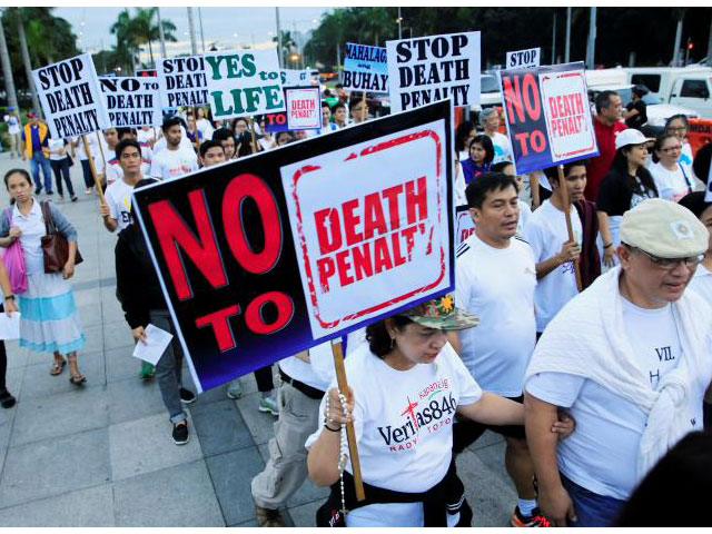 participants join a 039 procession 039 against plans to reimpose death penalty promote contraceptives and intensify drug war during 039 walk for life 039 in luneta park metro manila philippines february 18 2017 photo reuters