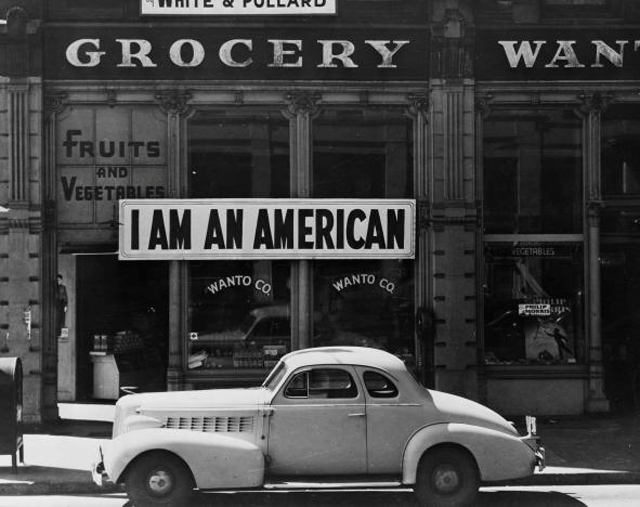 a large sign reading 039 i am an american 039 placed in the window of a store at 13th and franklin streets on december 8 the day after pearl harbor is pictured in oakland california in this march 1942 handout photo photo reuters