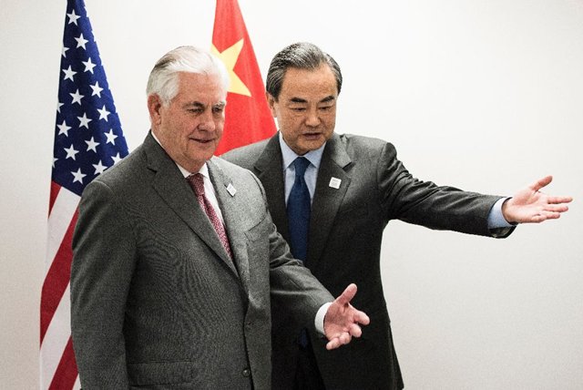 us secretary of state rex tillerson l and china 039 s foreign minister wang yi meet on the sidelines of the g20 in bonn western germany february 17 2017 photo afp