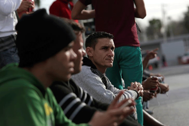 cubans stranded in mexico stand outside the border bridge after washington repealed a measure granting automatic residency to virtually every cuban who arrived in the united states in nuevo laredo mexico january 25 2017 photo reuters