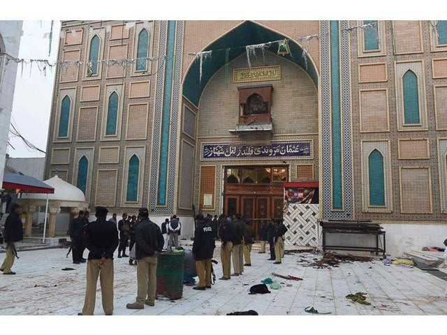 security personnel stand guard at the shrine photo afp security personnel stand guard at the shrine photo afp