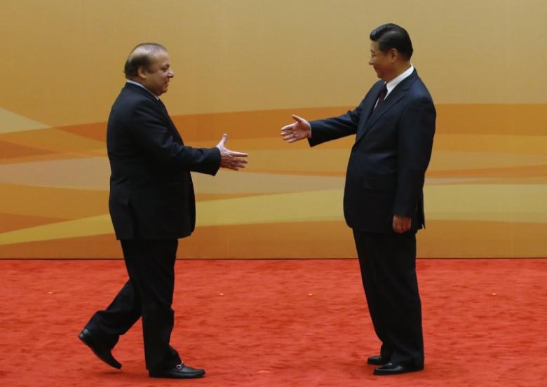 china 039 s president xi jinping r shakes hands with pakistan 039 s prime minister nawaz sharif at their family photo session prior to the dialogue on strengthening connectivity partnership at the diaoyutai state guesthouse in beijing november 8 2014 photo reuters