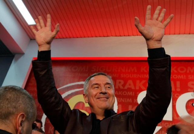 montenegrin prime minister and leader of ruling democratic party of socialist milo djukanovic wave to supporters after the parliamentary elections in podgorica montenegro october 17 2016 photo reuters montenegrin prime minister and leader of ruling democratic party of socialist milo djukanovic wave to supporters after the parliamentary elections in podgorica montenegro october 17 2016 photo reuters
