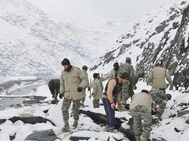 chitral scouts conduct a rescue operation in an avalanche hit area photo inp