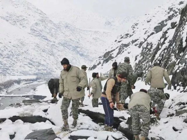 chitral scouts conduct a rescue operation in an avalanche hit area photo inp chitral scouts conduct a rescue operation in an avalanche hit area photo inp