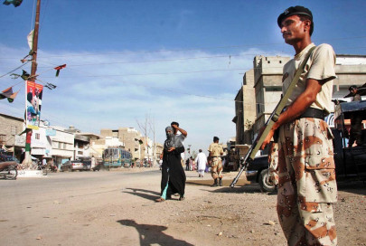 in the line of fire orangi town turns battleground over lack of police action in the line of fire orangi town turns battleground over lack of police action