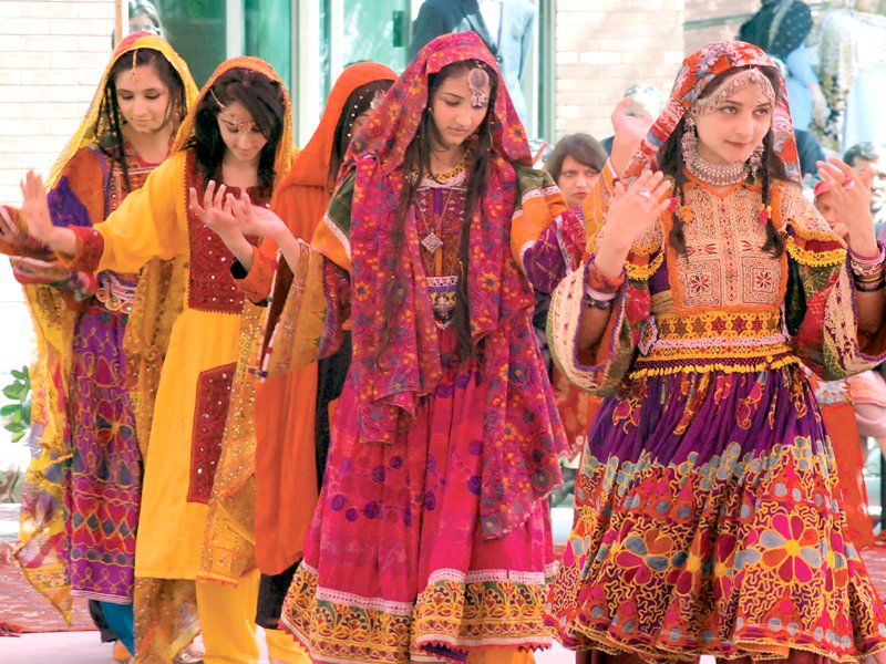 students performing judo karate left and dancing clad in traditional garb at the annual sports showcase at imcg on tuesday photos muhammad javaid inp