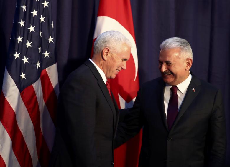 us vice president mike pence and turkish prime minister binali yildirim pose for a picture before their meeting at the 53rd munich security conference in munich germany february 18 2017 photo reuters